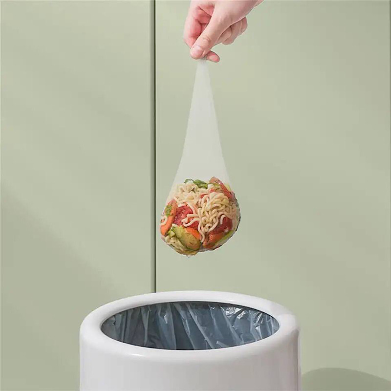 تفاله گیر گوشه سینک به همراه 50 عدد توری